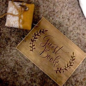 Guest book pen and stand with pages inside